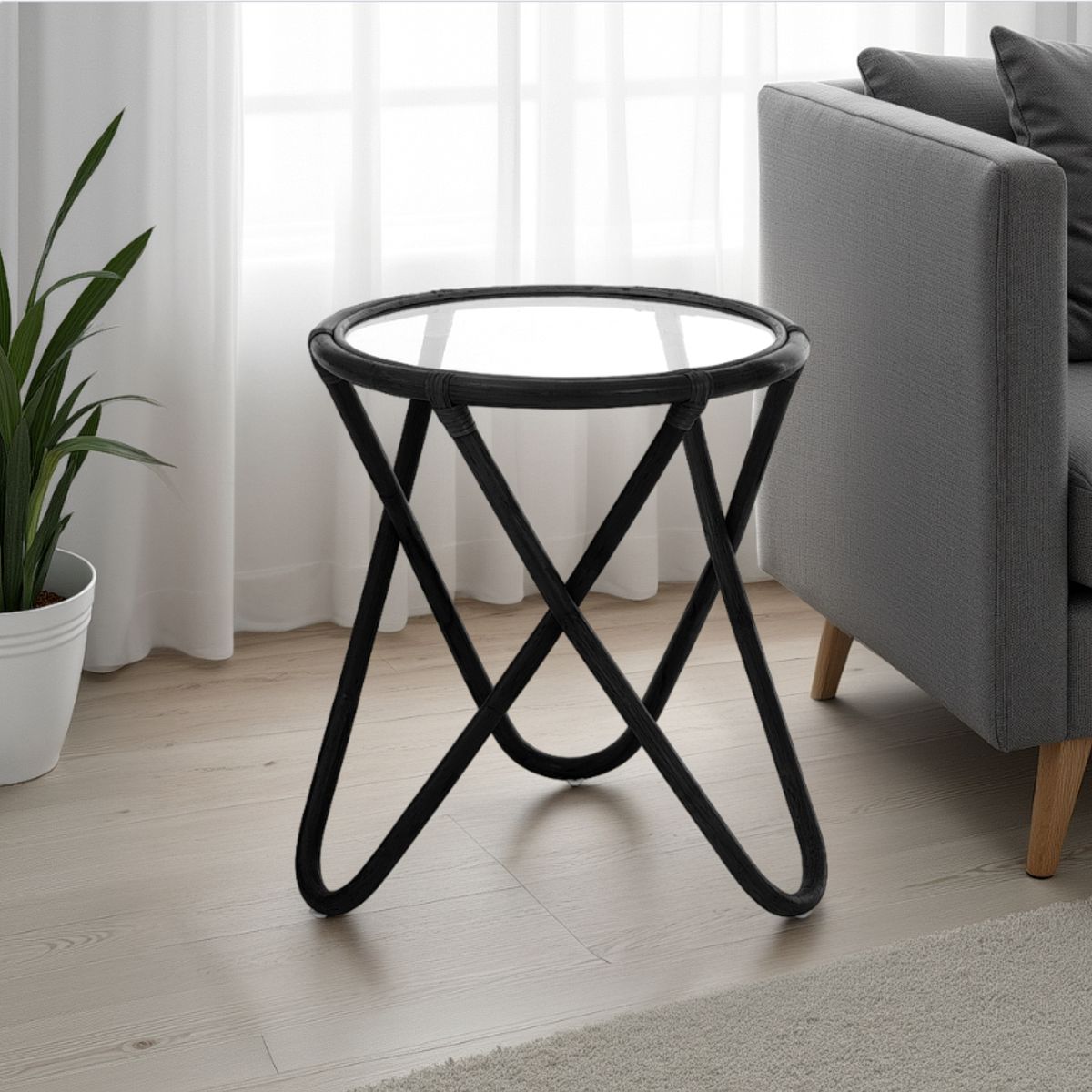 Table basse Ken noire en rotin noir et verre. diamètre 47 cm. hauteur 55 cm