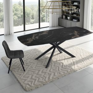Table extensible Greta. finition céramique effet marbre. piètement en métal noir et or. hauteur 75 mm. profondeur 90 mm. largeur 140/200 mm. 6 à 8 couverts. mécanisme pivotant
