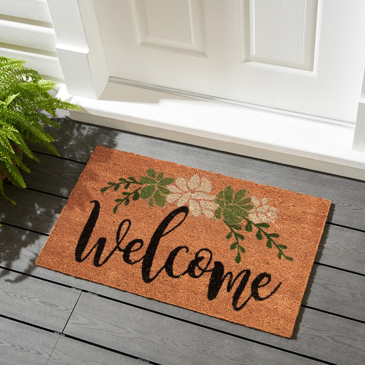 Paillasson fleuri en fibres de coco et PVC antidérapant. 45 x 75 x 2 cm